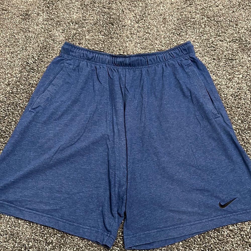 Men’s large Heathered blue Nike shorts.
